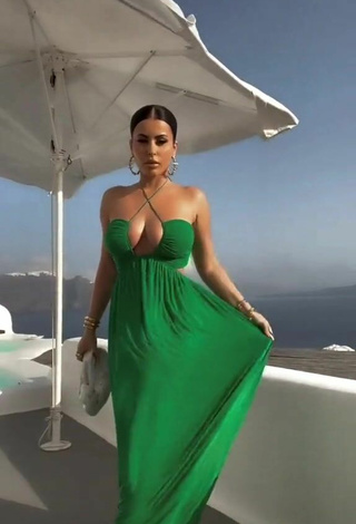 6. Hot Amra Olevic Shows Cleavage in Green Dress