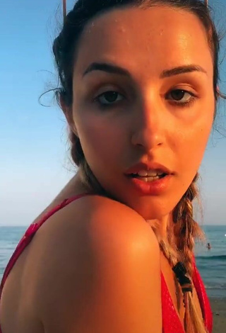 6. Sweet Beatrice Cossu Shows Cleavage in Cute Red Bikini Top at the Beach