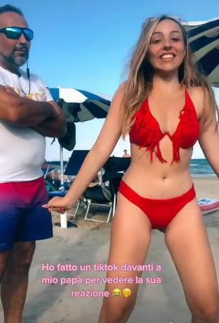 6. Cute Beatrice Cossu Shows Cleavage in Red Bikini and Bouncing Boobs at the Beach