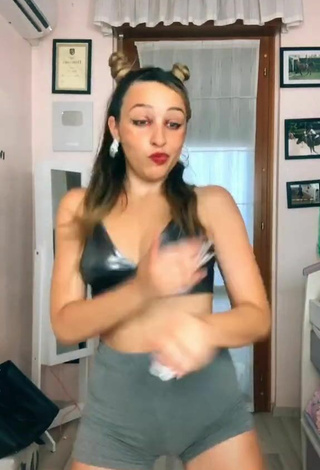 6. Erotic Beatrice Cossu Shows Cleavage in Silver Crop Top and Bouncing Tits
