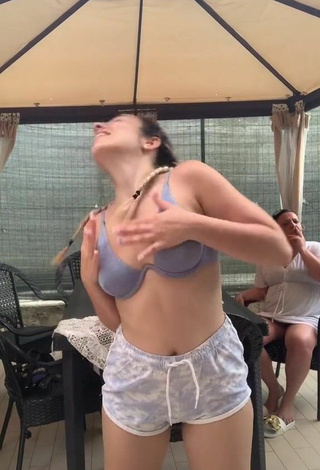 5. Beautiful Beatrice Cossu Shows Cleavage in Sexy Blue Bikini Top and Bouncing Tits