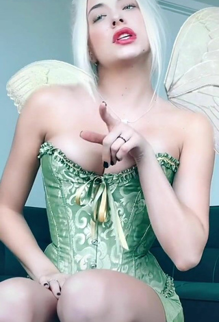 3. Hot Bella Martinez Shows Cleavage in Light Green Corset