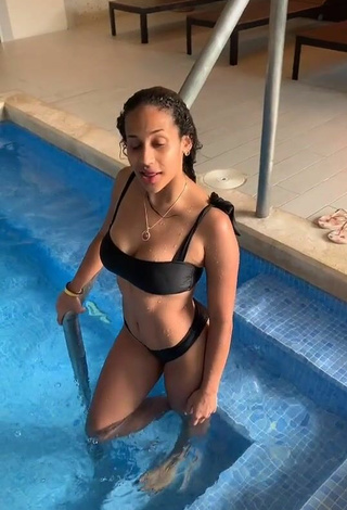 2. Cute Camila Mejia Shows Cleavage in Black Bikini at the Pool