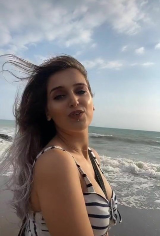 Hot Cemre Shows Cleavage in Crop Top at the Beach