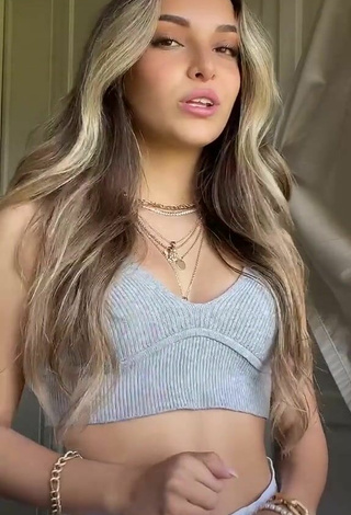 4. Hot Corinne Pino Shows Cleavage in Grey Crop Top