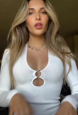 4. Beautiful Corinne Pino Shows Cleavage in Sexy White Dress