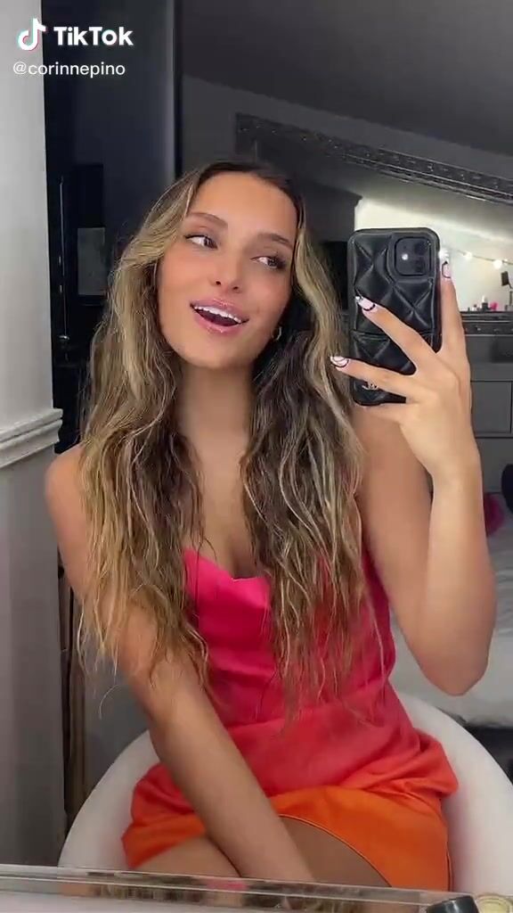 Hot Corinne Pino Shows Cleavage in Dress | sexyfilter.com