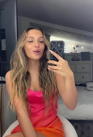 Sexy Corinne Pino Shows Cleavage in Dress