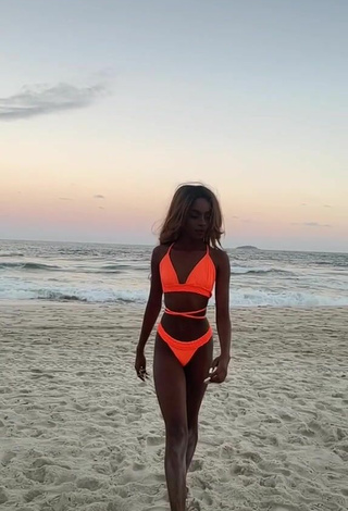 2. Cute diveludo in Electric Orange Bikini at the Beach