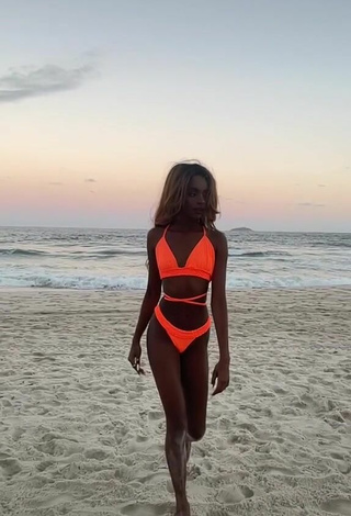 4. Cute diveludo in Electric Orange Bikini at the Beach