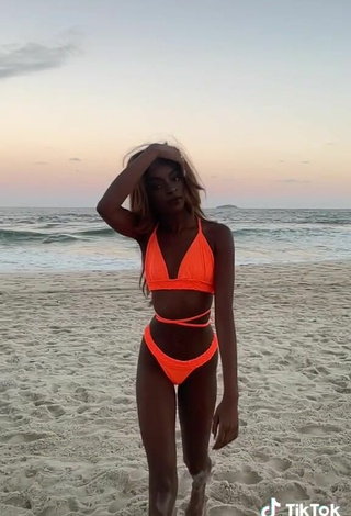 6. Cute diveludo in Electric Orange Bikini at the Beach