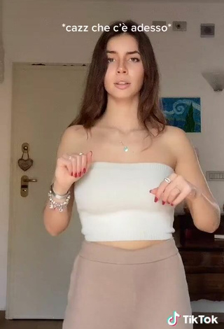 5. Sexy Eleonora Shows Cleavage in White Tube Top