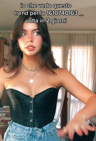 5. Sexy Eleonora Shows Cleavage in Black Corset
