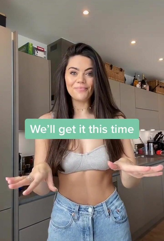3. Sexy Emily Canham Shows Cleavage in Silver Crop Top