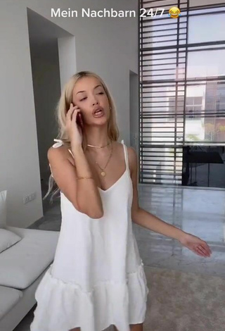 2. Sexy Enisa Bukvic Shows Cleavage in White Dress