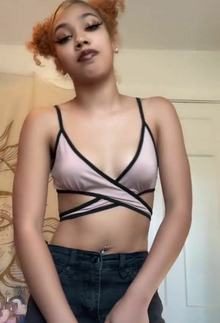 4. Beautiful Essence Shows Cleavage in Sexy Crop Top