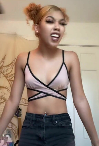 5. Beautiful Essence Shows Cleavage in Sexy Crop Top