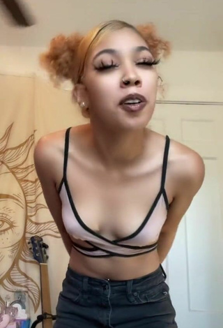 6. Beautiful Essence Shows Cleavage in Sexy Crop Top