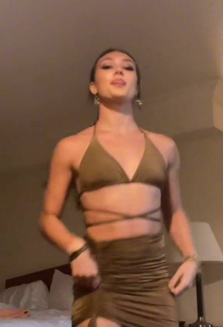 4. Sexy Abby Fenwick Shows Cleavage in Brown Bikini Top