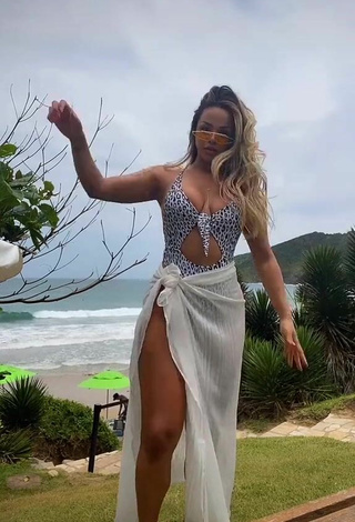 Sweetie Gabily Shows Cleavage in Leopard Swimsuit