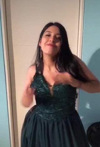 4. Sweetie Gianella Clavijo Shows Cleavage in Green Dress