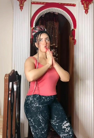 Hot Israa Nageeb Shows Cleavage in Pink Tank Top