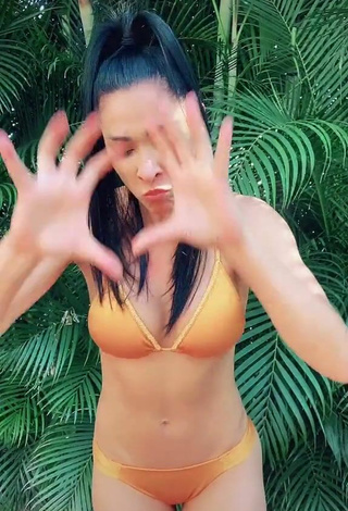5. Sexy Jaqueline Shows Cleavage in Orange Bikini