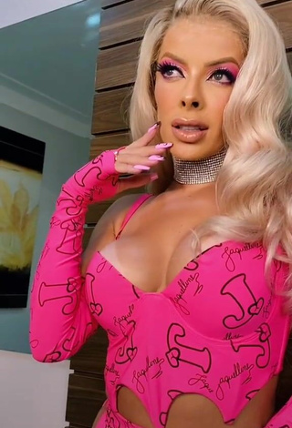 2. Sexy Jaquelline Shows Cleavage in Firefly Rose Crop Top