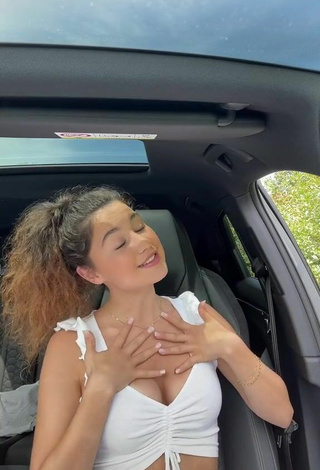 Cute Jesina Shows Cleavage in White Crop Top
