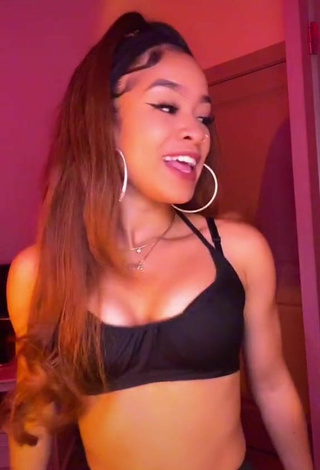 4. Dazzling Lanii Kay Shows Cleavage in Inviting Black Crop Top