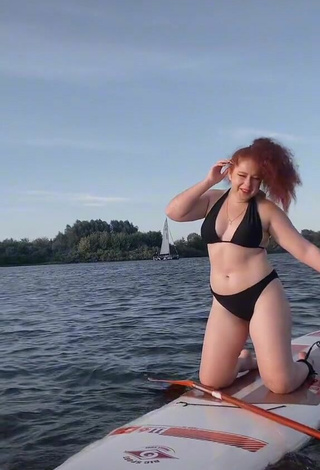 5. Hot Elizaveta Strizh Shows Cleavage in Black Bikini in the Sea