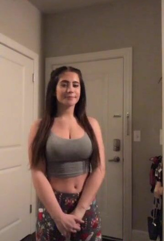 6. Pretty Lizzy Wurst Shows Cleavage in Grey Crop Top