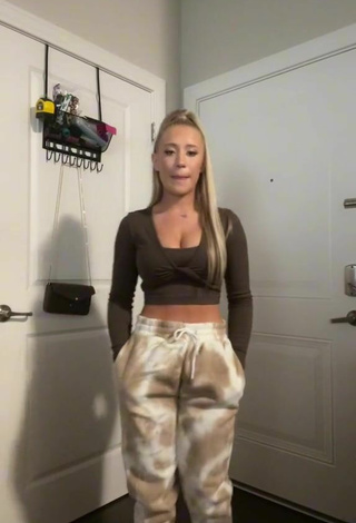 Hot Lizzy Wurst Shows Cleavage in Brown Crop Top