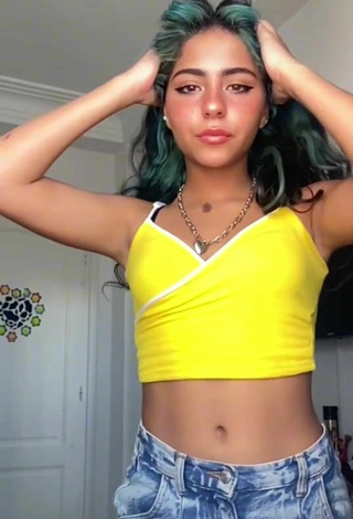 3. Sexy Malouka Iren Shows Cleavage in Yellow Crop Top