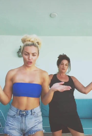 1. Hot Mandy Rose Shows Cleavage in Blue Tube Top