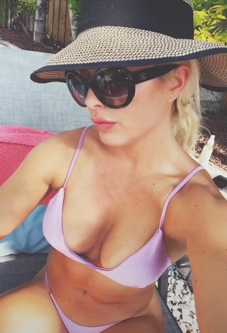 5. Sweet Mandy Rose Shows Cleavage in Cute Purple Bikini