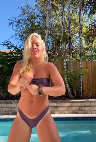 6. Hottie Mandy Rose Shows Cleavage in Purple Bikini and Bouncing Breasts