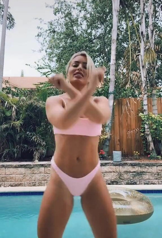 4. Beautiful Mandy Rose Shows Cleavage in Sexy Peach Bikini at the Pool