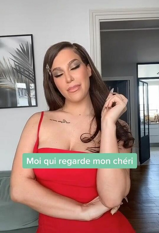 3. Hot Océane Shows Cleavage in Red Dress