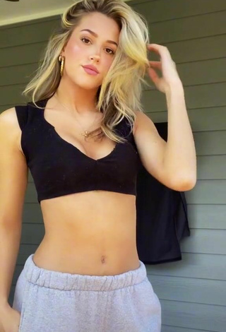 Cute Olivia Massucci Shows Cleavage in Black Crop Top