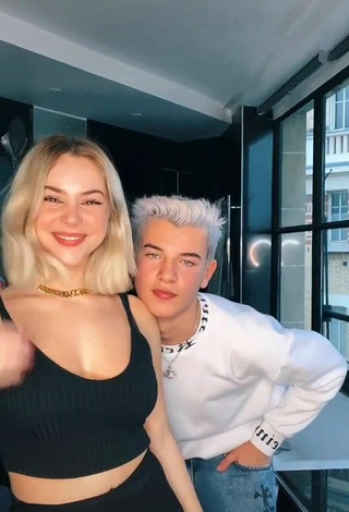 Hottie Romane Bertrand Shows Cleavage in Black Crop Top
