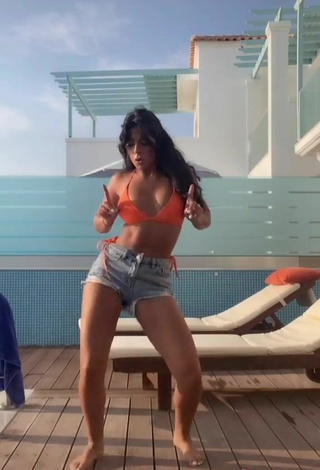 4. Sexy Sabrine Khan Shows Cleavage in Orange Bikini Top