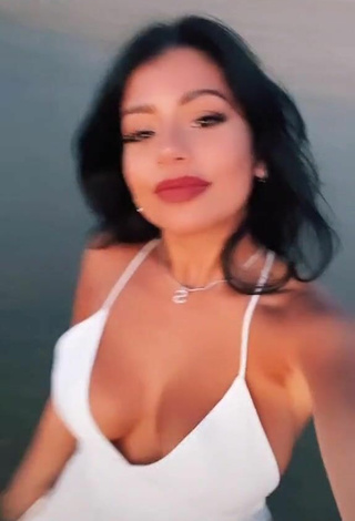 3. Hottie Sabrine Khan Shows Cleavage in White Dress