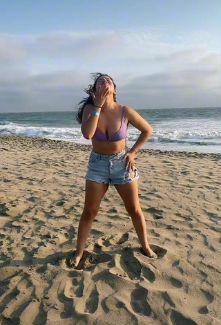 4. Sexy Samantha Grey Shows Cleavage in Purple Bikini Top at the Beach