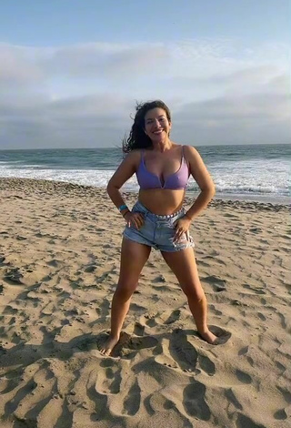 5. Sexy Samantha Grey Shows Cleavage in Purple Bikini Top at the Beach