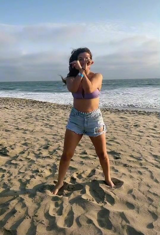 6. Sexy Samantha Grey Shows Cleavage in Purple Bikini Top at the Beach
