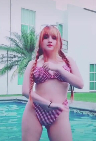 6. Sweetie San Chan Claudia Shows Cleavage in Bikini at the Pool