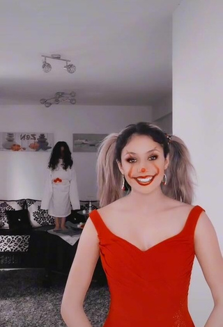 Sexy Norah Prigent Shows Cleavage in Red Dress