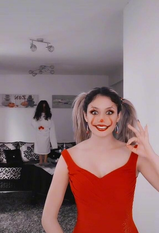 2. Sexy Norah Prigent Shows Cleavage in Red Dress