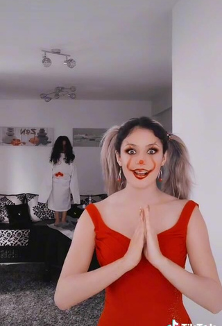 3. Sexy Norah Prigent Shows Cleavage in Red Dress